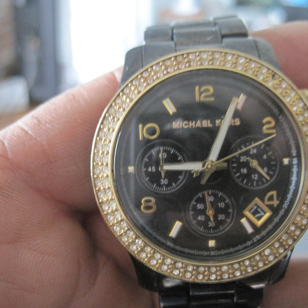 Genuine Michael Kors watch.